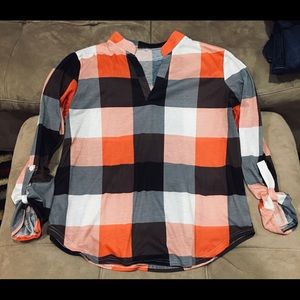 Pretty fall colored shirt.